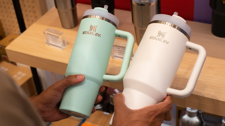 Two Stanley water bottles in a store