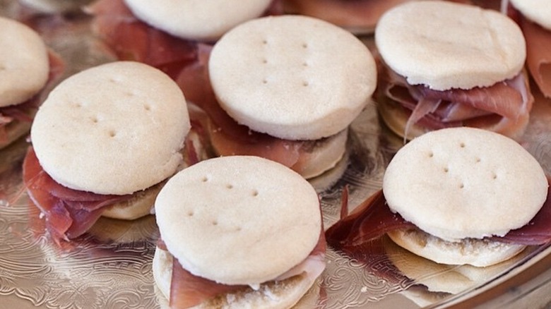 closeup of beaten biscuits with country ham