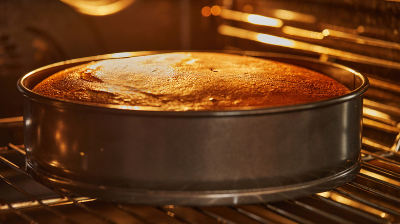 A cake is baking in the oven.