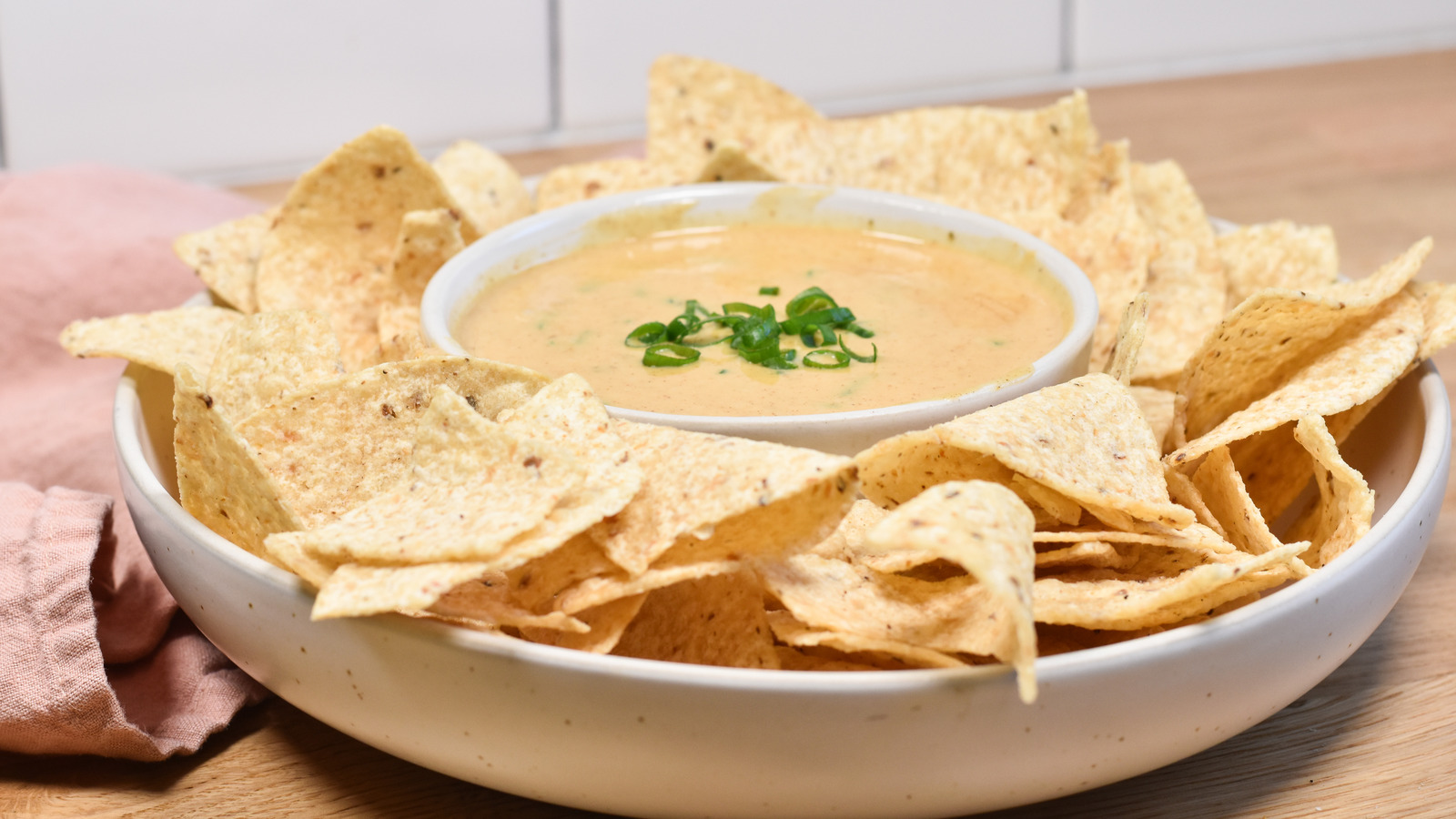Why White American Cheese Works Best When Making A Smoky Queso Dip