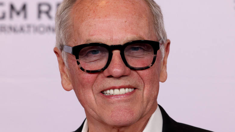 Wolfgang Puck smiling with glasses