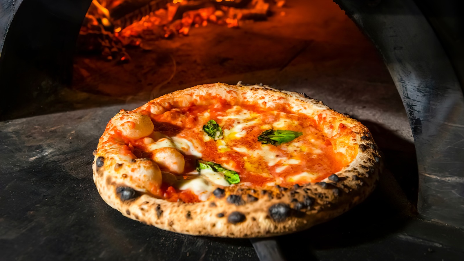 Why Wood Fired Pizza Tastes So Much Better Than The Oven