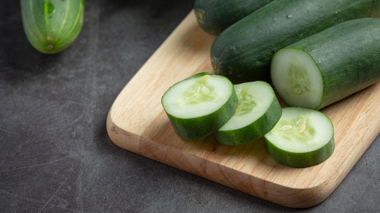 Cucumber slices on cutting board