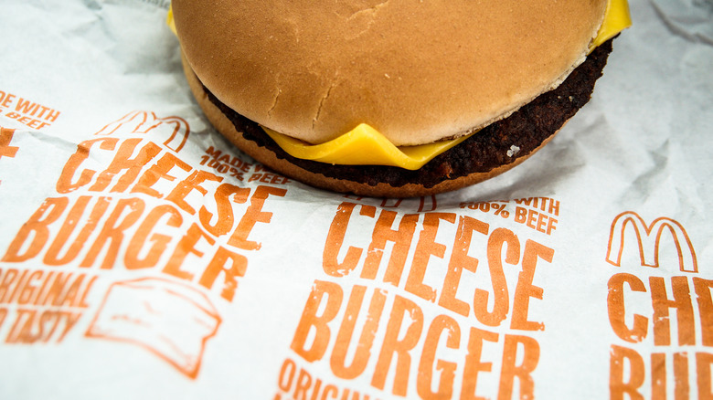 McDonald's cheeseburger in wrapper