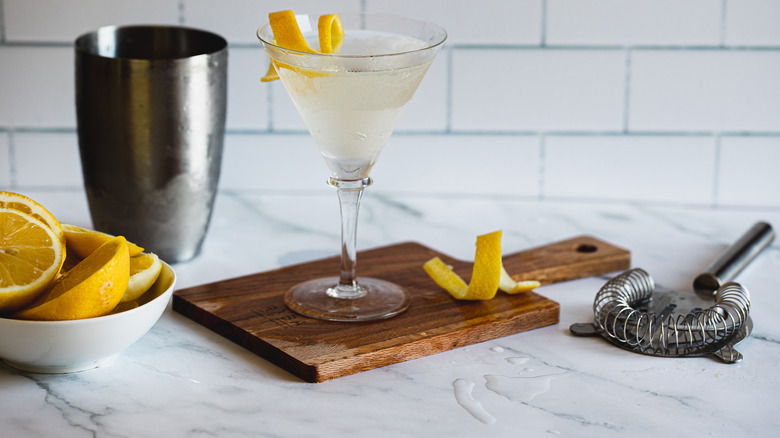 Vesper martini with shaker and lemons