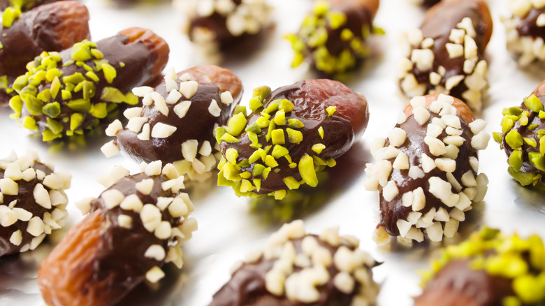 Dates covered in chocolate and pistachios