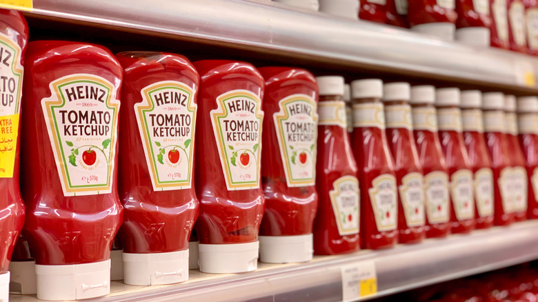 Rows of Heinz tomato ketchup on shelf