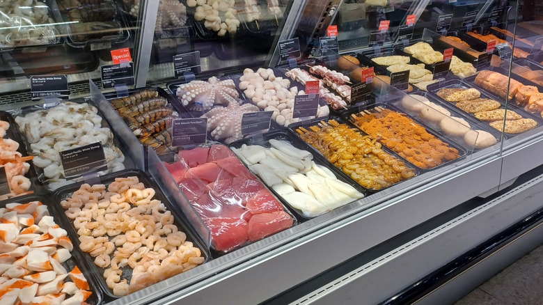 Fresh seafood at a grocery store seafood counter