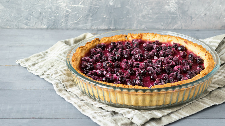 berry pie in glass pan