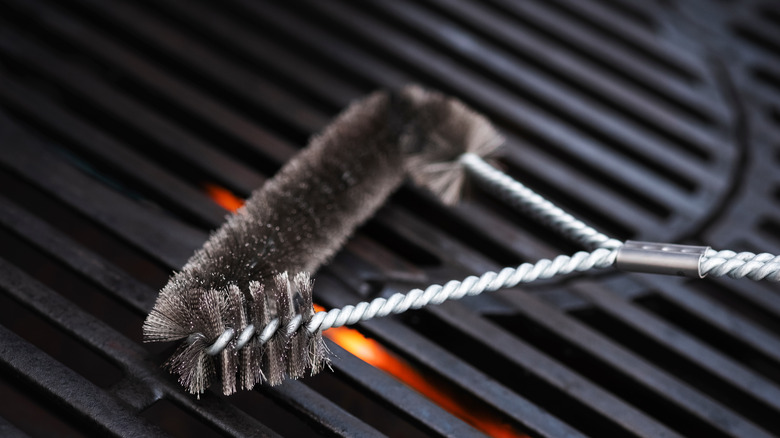 Cleaning grill with metal brush