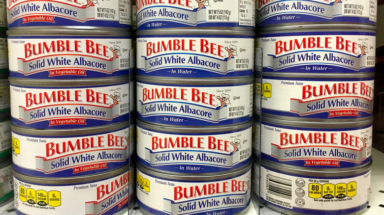 Cans of tuna in a grocery store 