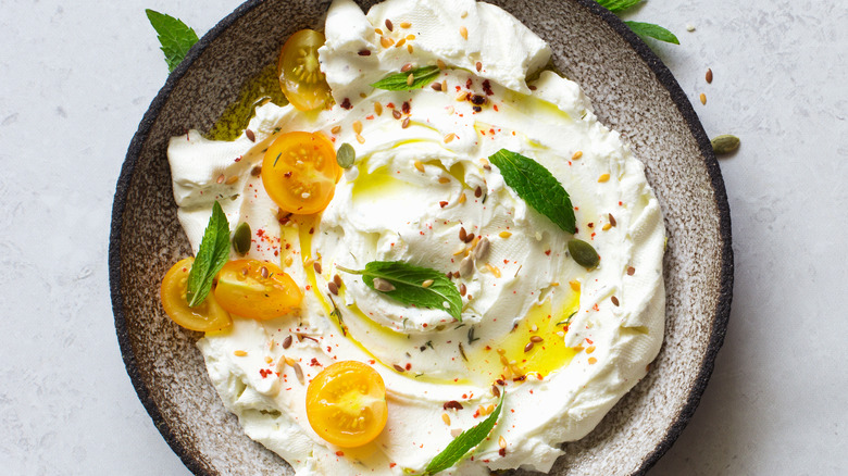 Labneh with garnishes in a bowl