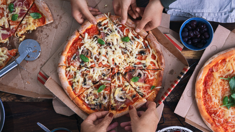 Pizza in takeout box