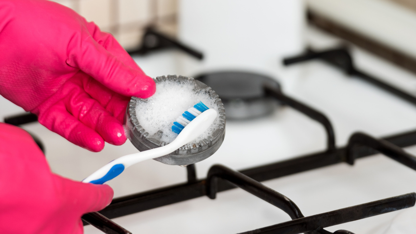 Why You Should Be Using A Toothbrush When Cleaning Your Stovetop