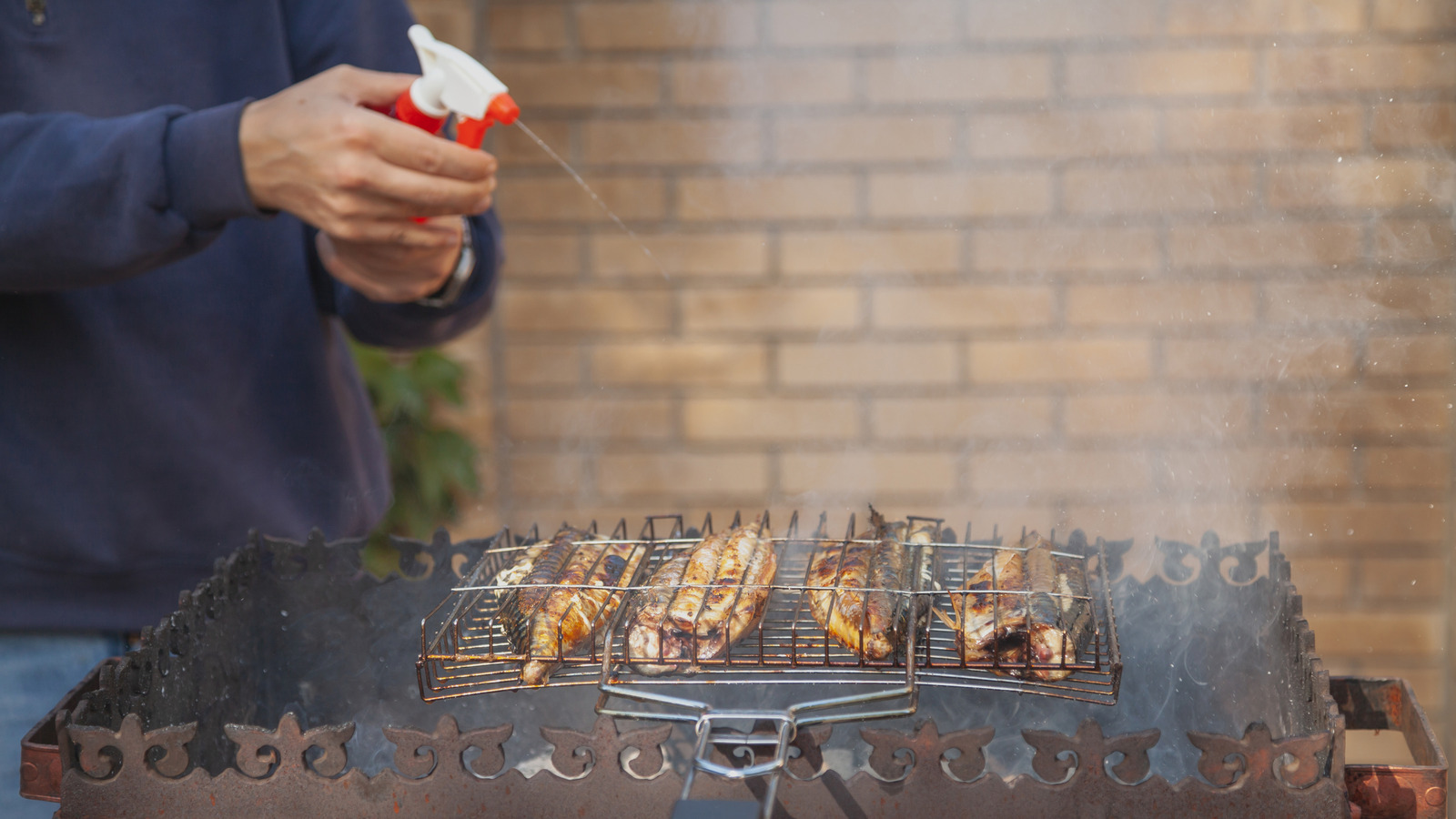 Why You Should Keep A Spray Bottle Of Apple Juice Next To Your Grill - Tasting Table
