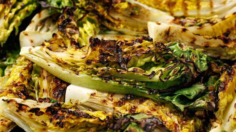 grilled halved heads of romaine lettuce