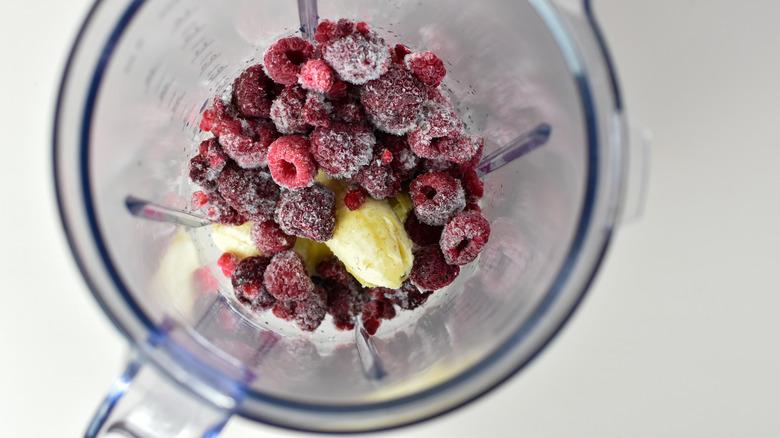 blending frozen berries