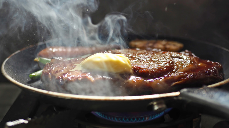 smoking steak pan seared