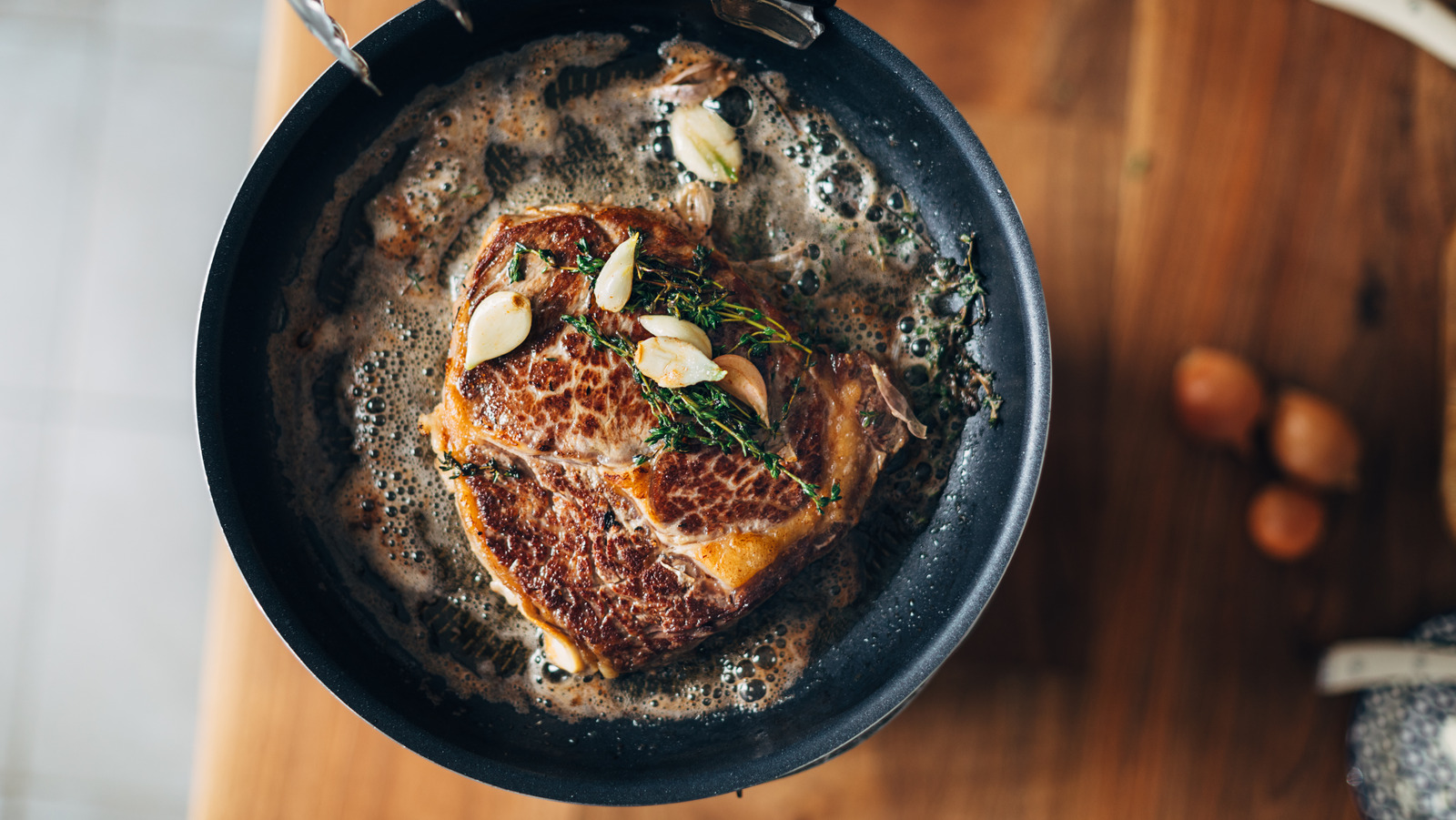 Why You Should Pour Warm Pan Drippings Over Steak Right Before Serving