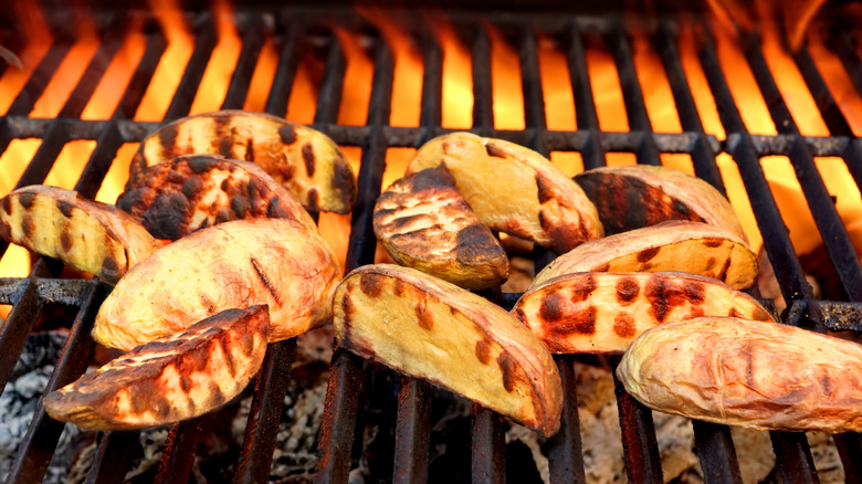 Potatoes on a fiery grill