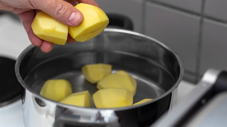 potatoes in water pot