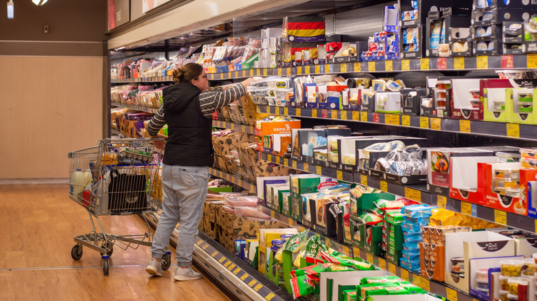 shopping at Aldi's cheese section