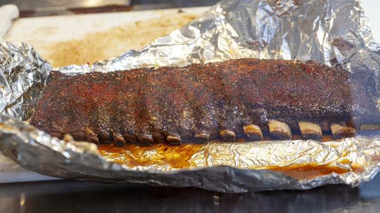 Piece of ribs sitting in foil