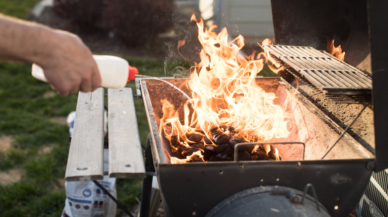 Why You Should Skip The Lighter Fluid When Firing Up The Grill