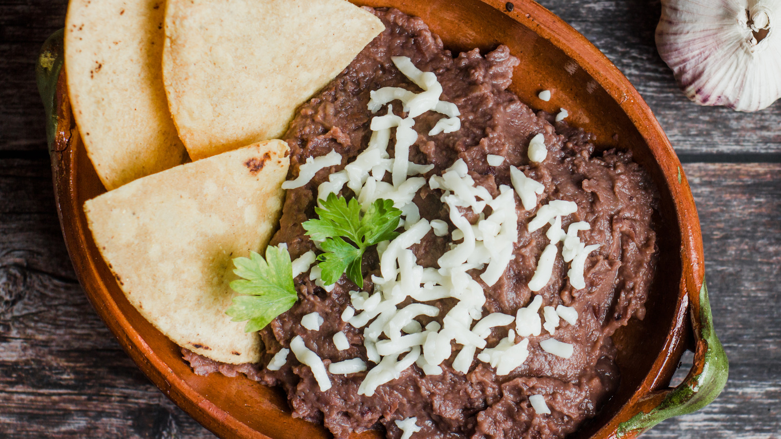 Why You Should Start Adding Milk To Your Refried Beans