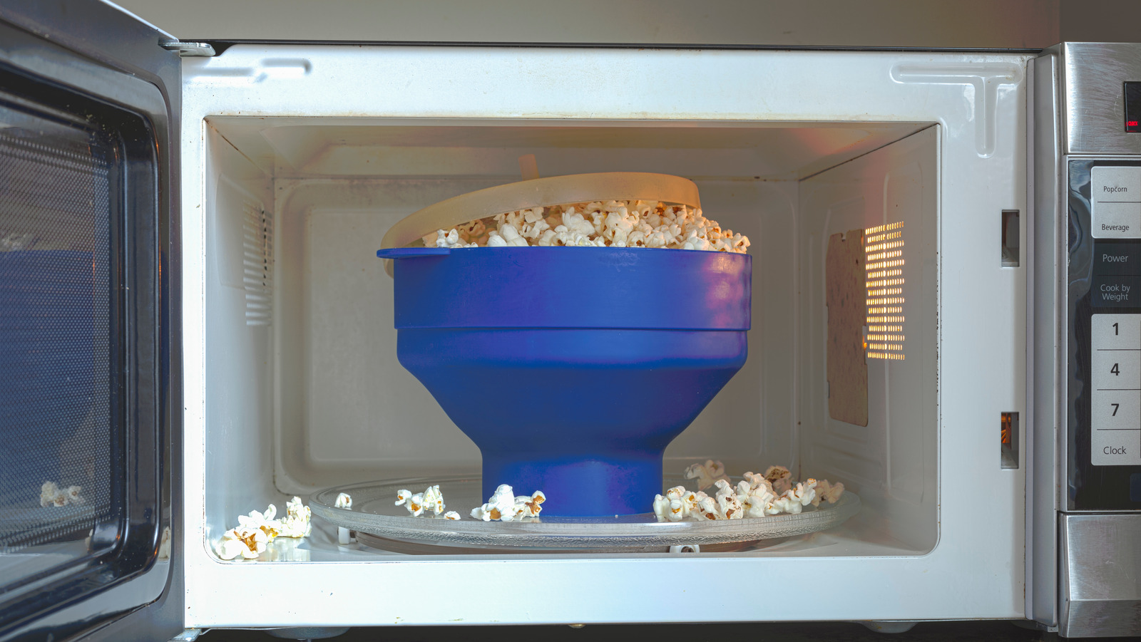 Why You Should Think Twice About Using The Popcorn Button On Your Microwave