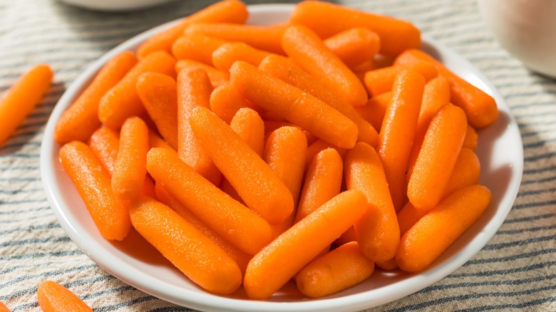 small plate of baby carrots