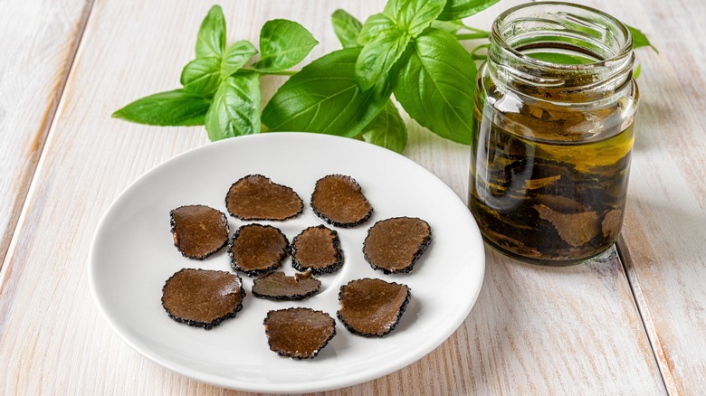 canned truffles sliced on plate