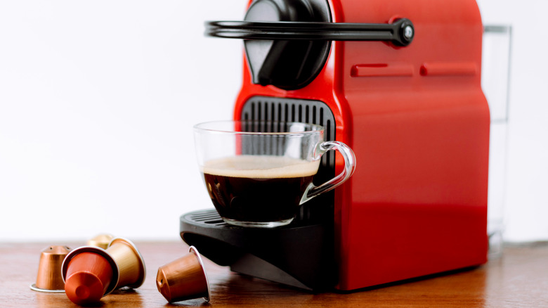 Nespresso machine with empty coffee pods