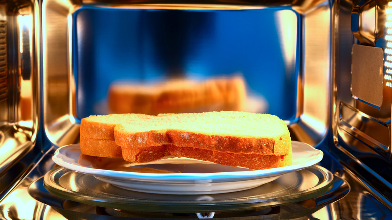 two slices of bread in microwave