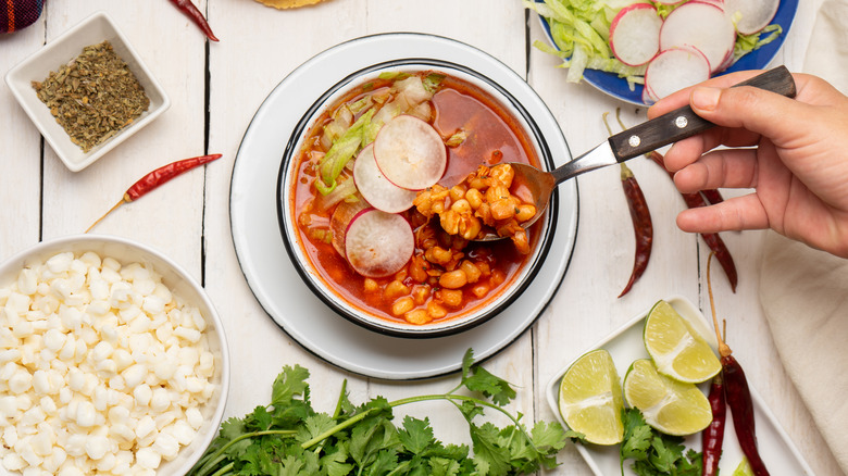 red pozole in fresh hominy