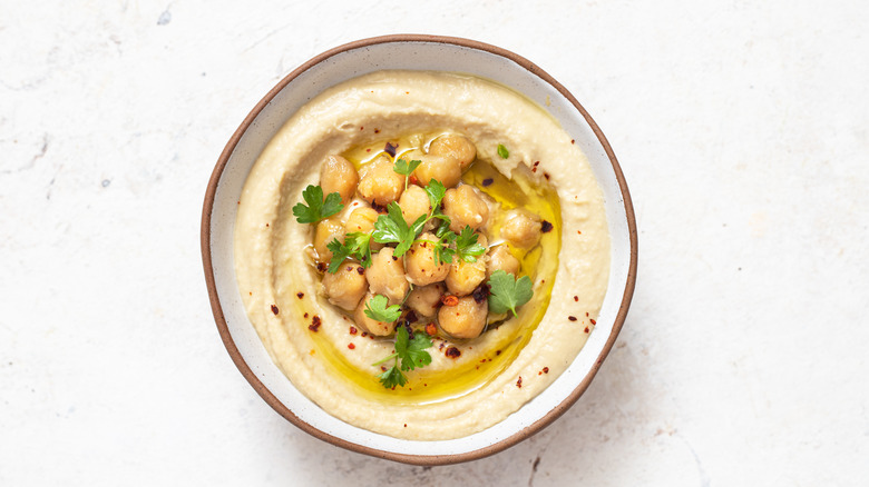 traditional hummus with olive oil and chickpeas