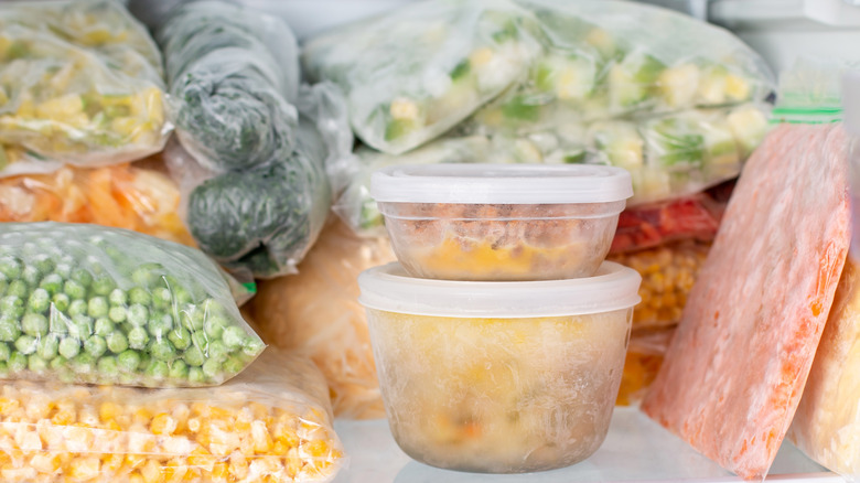 frozen food in bags and plastic containers