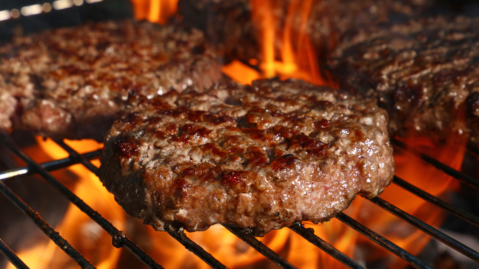 Why You Shouldn't Press Burgers While Cooking