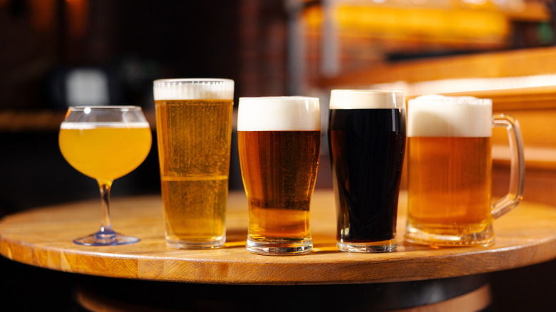 a selection of different beer styles in different glassware