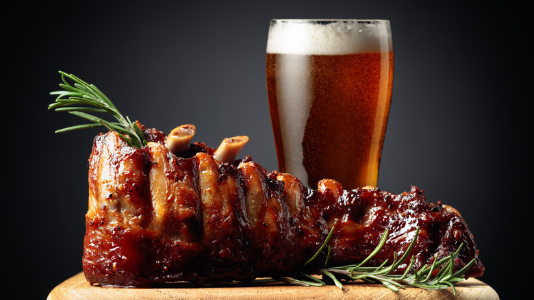 Roasted meat with glass of beer
