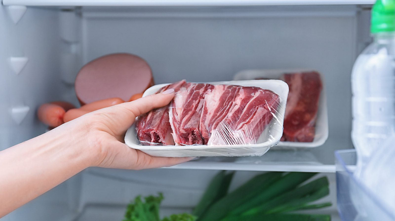 Why You Shouldn't Store Meat In The Refrigerator Door