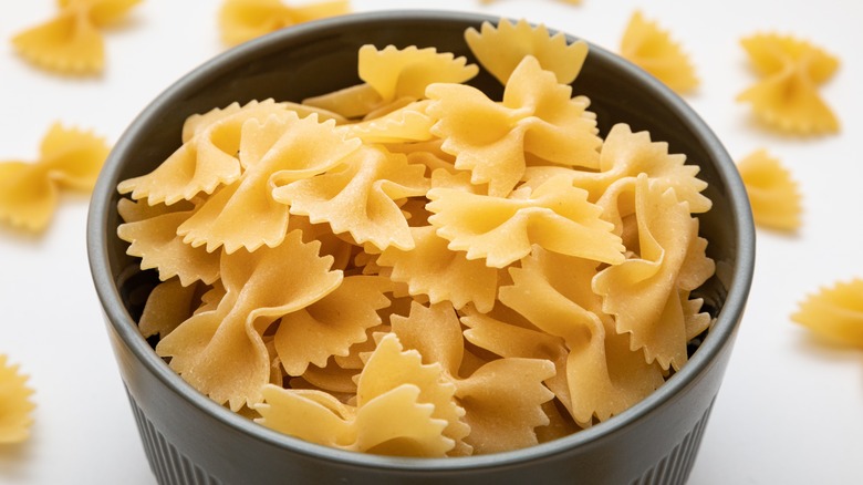 bowl of uncooked farfalle pasta