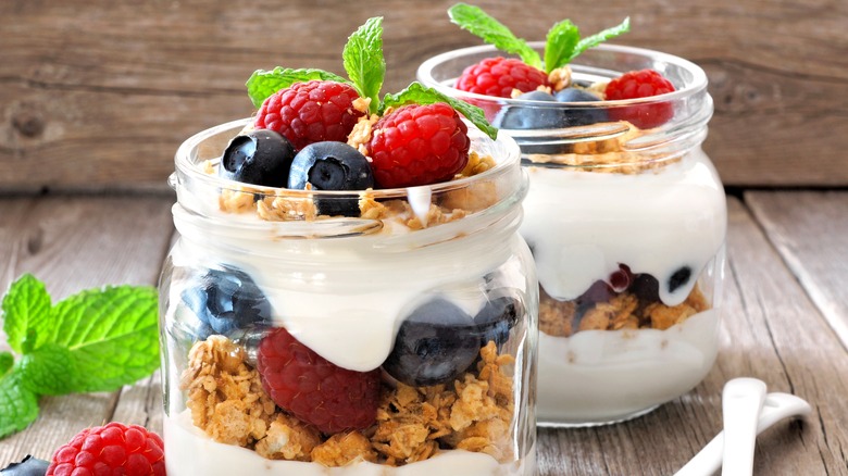 Berry yogurt parfaits in jars