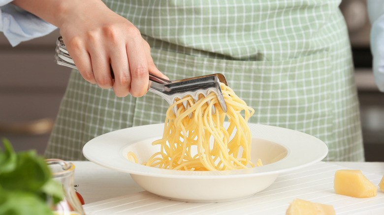 Pasta tongs serving spaghetti