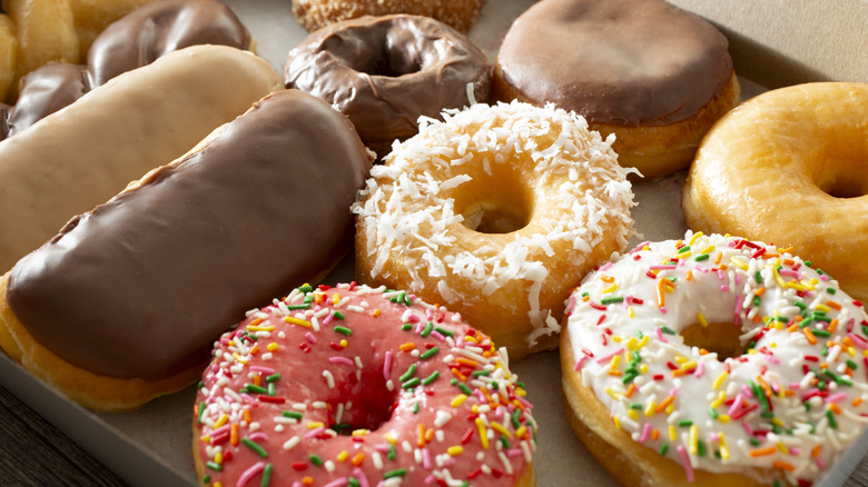 an assortment of donuts inside box
