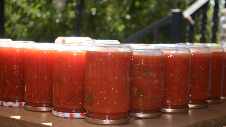 Jars filled with tomato juice