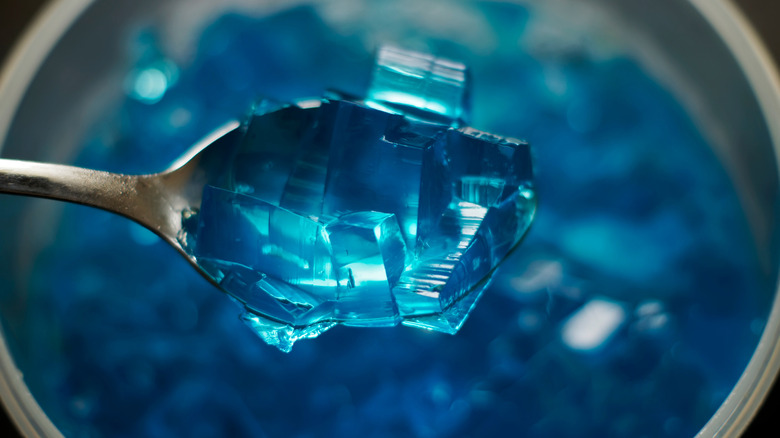 Blue gelatin in a spoon