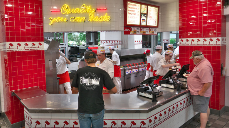 Inside of an In-N-Out restaurant with customers and workers