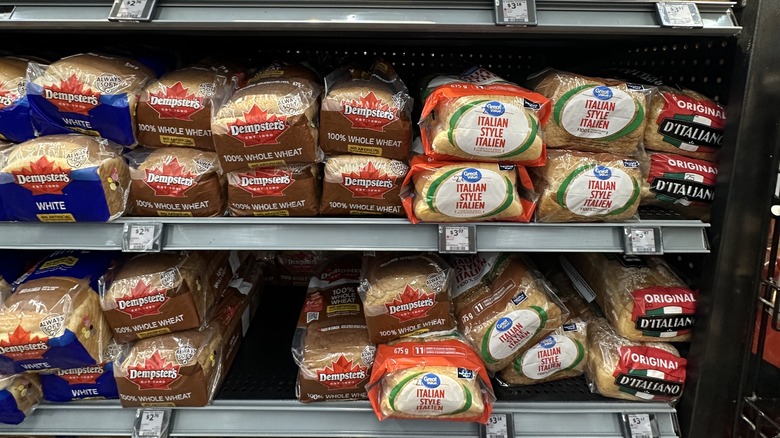 Bread, Shopping inside Walmart retail store showing aisles and product displays.