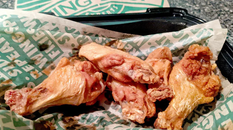 Wingstop's plain wings in a to-go container